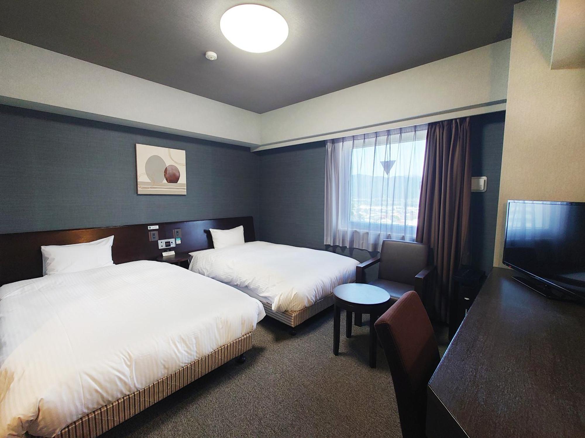 Hotel Route-Inn Komagane Inter Exteriör bild